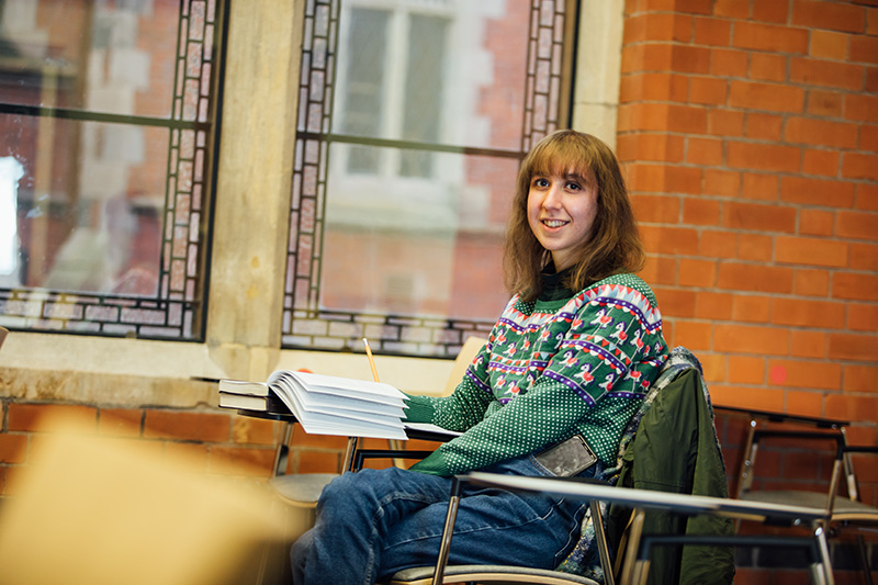 Student studying in Graduate School room 