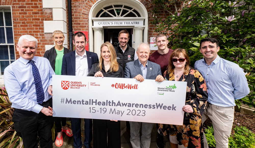 Mental Health Awareness Week 2023 - panel members outside QFT holding promotional banner