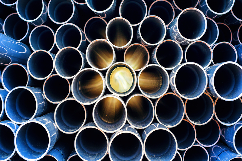 Inside of a pile of metal tubes