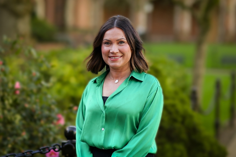 Suzanne Walsh standing in Queen's quadrangle